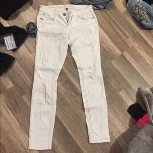 Vanity white ripped jeans